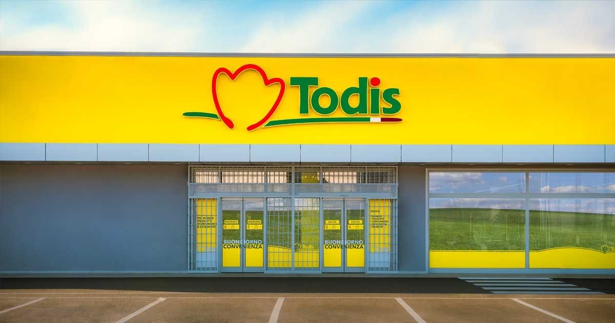 Exterior of a Todis supermarket with bright yellow signage and large glass entrance.
